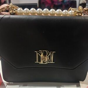 Badgley Mischka Double-Sided Crossbody Black & Blush with Faux Pearls handle.